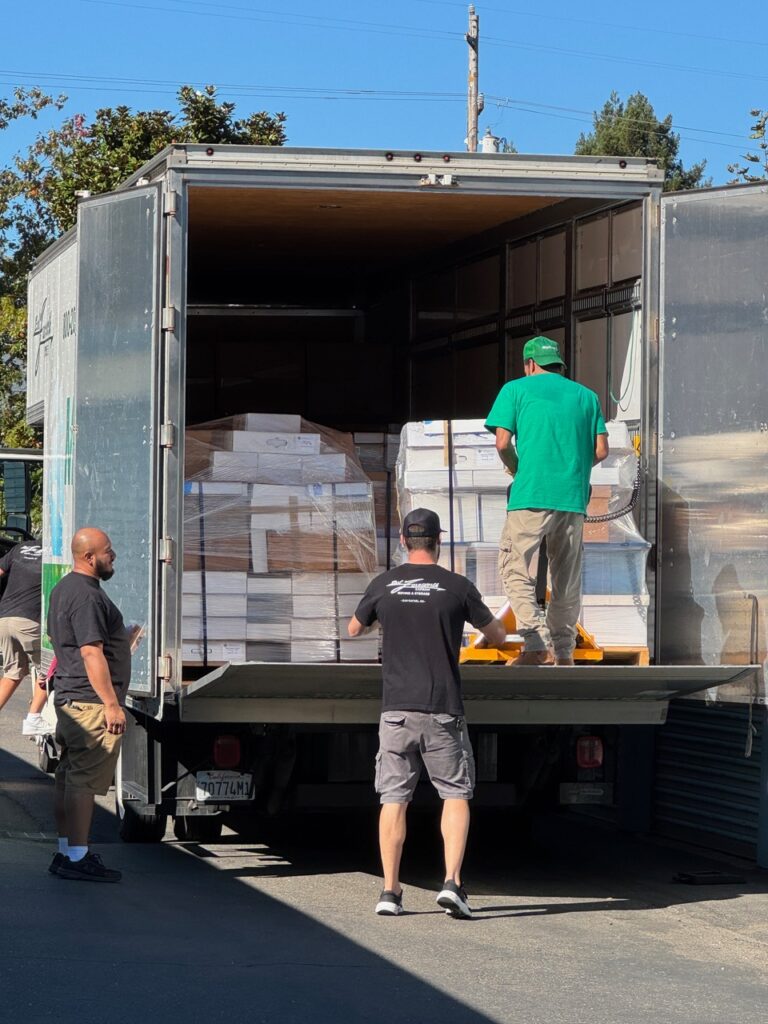 men in a moving truck