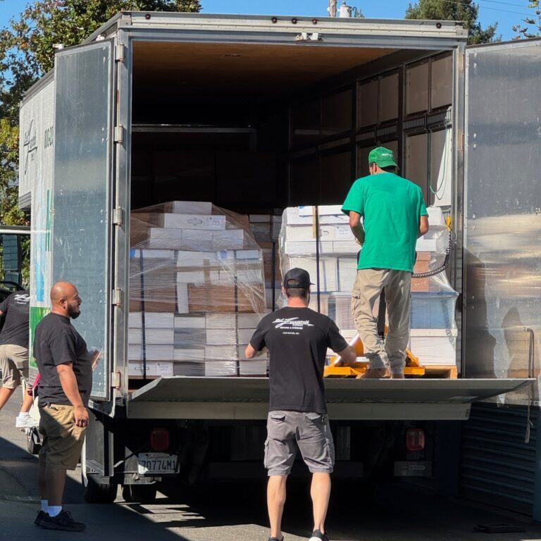 men in a moving truck
